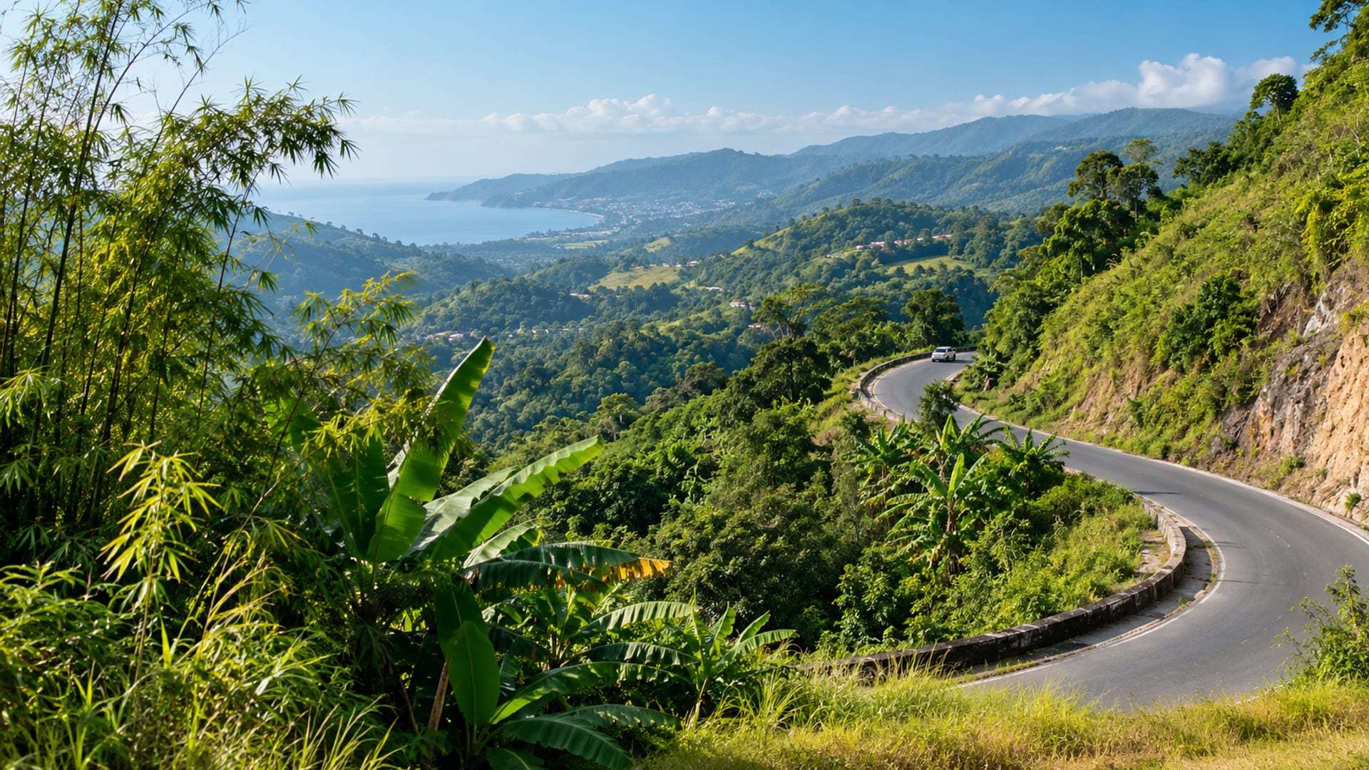 Winding hill road through green hills with a tiny plain vehicle far on a distant curve in clear morning light