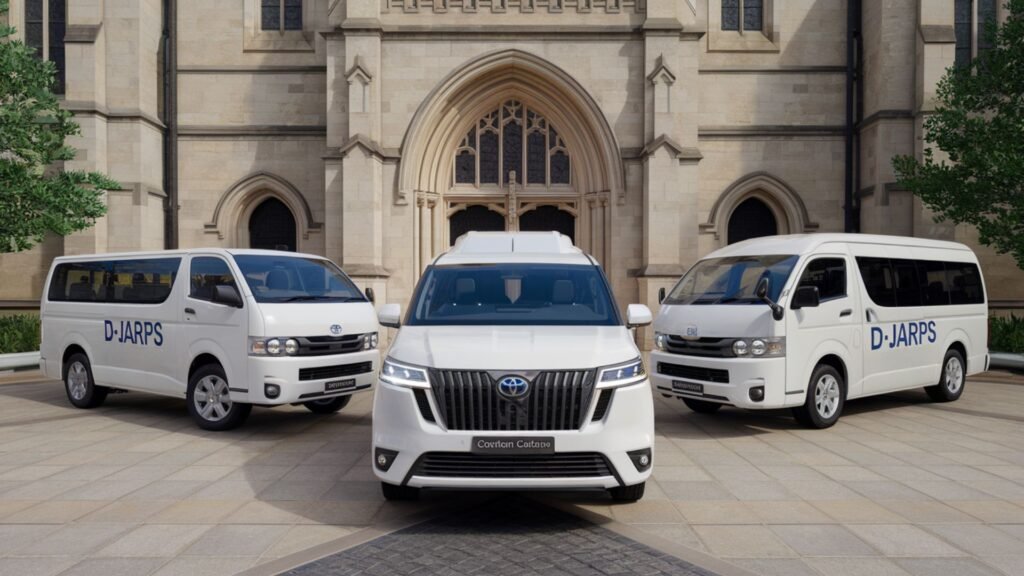 Mixed fleet of modern Toyota vehicles - Coaster, Hiace, and small bus - arranged in harmony at Campion College's entrance, showcasing versatile school transport solutions